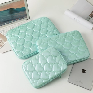 Three-piece mint green padded laptop sleeve set with heart quilting for MacBook and iPad