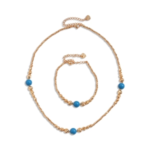 18K gold plated necklace and bracelet set with blue stone beads on a white background