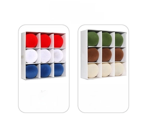 Detailed view of patriotic 8cm flocked ornaments in red, white and blue storage boxes