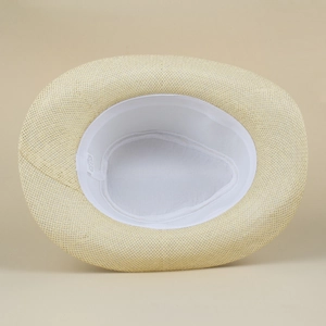 Detail shot of breathable straw fedora interior showing white sweatband and material label