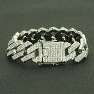 Silver iced out Cuban link bracelet with clear rhinestones and a secure box clasp closure