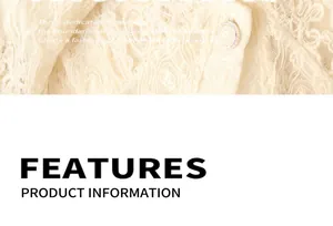 Close-up of cream floral lace texture with a delicate silver pearl button detail