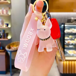 Pink translucent bulldog keychain with silicone strap for car keys or backpack charm