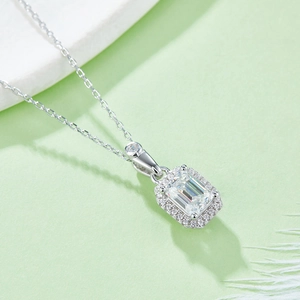 Elegant S925 silver necklace with emerald cut moissanite pendant in halo setting