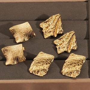 Irregular gold stainless steel geometric earrings with hammer texture and lava finish