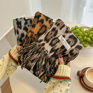 Classic leopard print cashmere scarf with elegant tassels for warm autumn winter styling