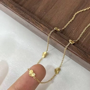 Gold-plated titanium steel necklace featuring radiant engraved heart charms for women