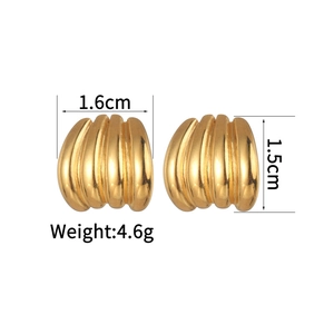 Detailed view of gold irregular textured earrings showing dimensions 1.6cm by 1.5cm