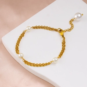 Elegant gold double-layered pearl bracelet with adjustable chain for women fashion