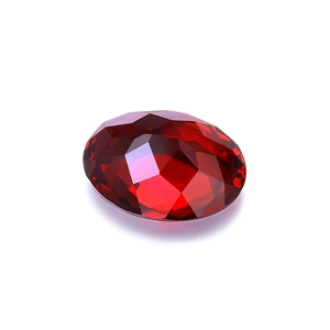 Oval cut lab-grown pigeon blood ruby gemstone with premium multi-faceted clarity