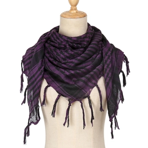 Detail shot of purple and black striped tactical desert scarf with classic fringe edges