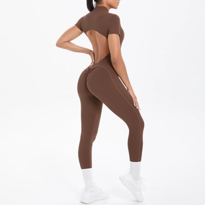 Close-up of back cutout and ruched butt-lifting detail on brown yoga jumpsuit