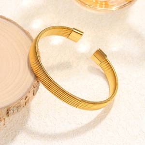 Minimalist gold titanium steel wire wave cuff bracelet with spiral texture finish
