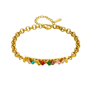 Golden chain bracelet with colorful rectangular gemstones and adjustable lobster clasp