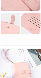 Pink passport wallet detail showing four card slots and an airplane engraved snap button