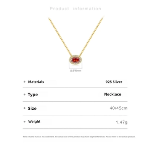 Detail view of 925 silver necklace with ruby oval pendant and zircon stones