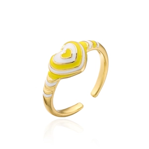 Detailed macro view of yellow and white enamel heart patterns on the gold adjustable ring