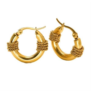 Minimalist gold hoop earrings with twisted metal design for a sleek high-end look