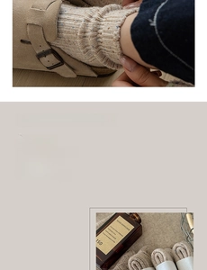 Detailed view of beige dotted yarn knit texture and versatile slouchy wool sock design