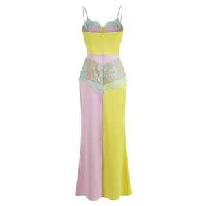Close-up of lace patchwork and satin fabric on the color-block maxi slip dress