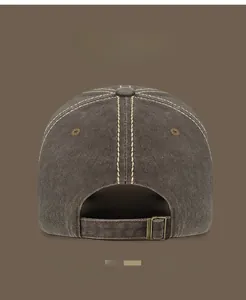 Detail view of vintage cotton baseball cap with adjustable metal buckle and multi-color options