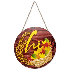 Rustic round wooden door sign with hi lettering and autumn maple leaves in basket