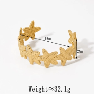 Detail of gold starfish bangle with dimensions 62mm diameter and 24mm height