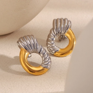 Two-tone 18K gold plated stainless steel hoop earrings with spiral geometric texture