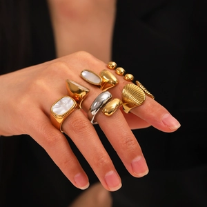 Gold and silver stainless steel rings set with mother of pearl shell inlay