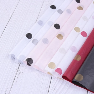Polka dot tissue paper sheets in various colors for floral bouquet gift wrapping