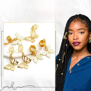 Detailed macro view of hollow butterfly charms and spiral clips for hair braids decoration