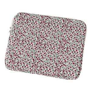 Housse d'ordinateur matelassée à motif floral rouge et vert avec fermeture blanche