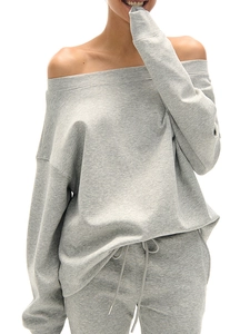 Light gray two-piece tracksuit featuring an off-shoulder long sleeve top and flared sweatpants
