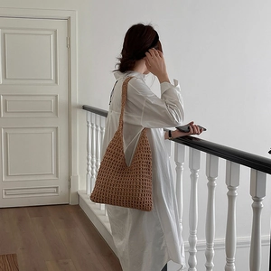 Minimalist brown hollow woven cotton shoulder bag for summer beach vacations