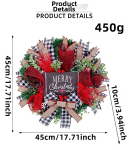 Detailed view of Merry Christmas wreath with red buffalo plaid bow and red berries