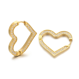 Elegant gold heart earrings with sparkling cubic zirconia on a clean white background