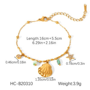 Detail of gold shell and starfish charm bracelet with measurement specs and bead chain
