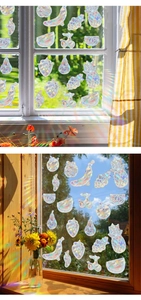 Rainbow suncatcher window stickers with fruit shapes projecting colorful light patterns