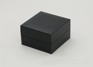 Detailed view of the black lychee pattern faux leather watch box with a lid