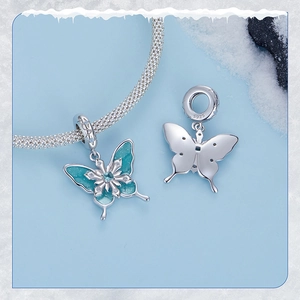 Winter collection S925 sterling silver snowflake butterfly charm with blue enamel details