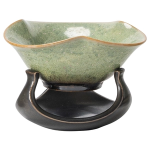Vintage ceramic tea strainer set with green kiln-glaze bowl and dark brown wavy base