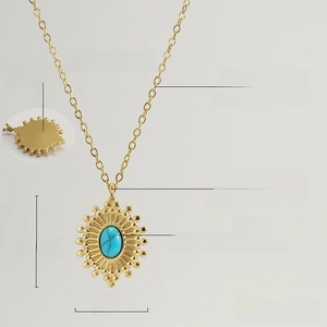 Detailed view of 18K gold plated stainless steel sunflower pendant with blue turquoise stone