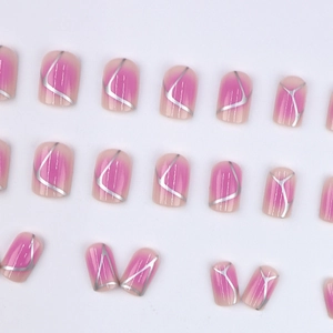 Short square pink blush press-on nails with silver geometric lines on white background