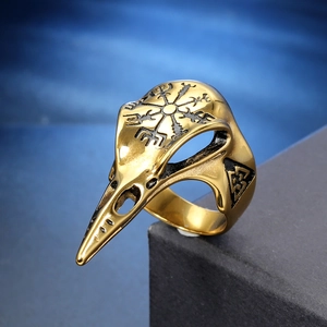 Macro view of Viking bird skull ring with Vegvisir compass and Valknut symbols