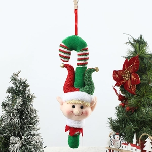 Detail of Christmas elf ornament with red and green stripes and white plush trim and bell