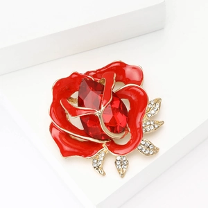 Exquisite red enamel rose brooch with crystal heart and rhinestone leaves on white background