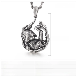 Detailed view of punk tiger pendant in vintage steel with crystal eyes and 67x44mm dimensions