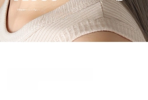 Detailed macro view of the fine ribbed texture and V-neckline on a beige knitted vest