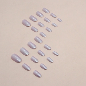 Set of 24 oval lilac press-on nails with shimmery aurora finish and pearlescent metallic glow