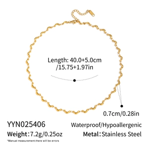 Detail view of gold crescent moon necklace showing dimensions and stainless steel specs